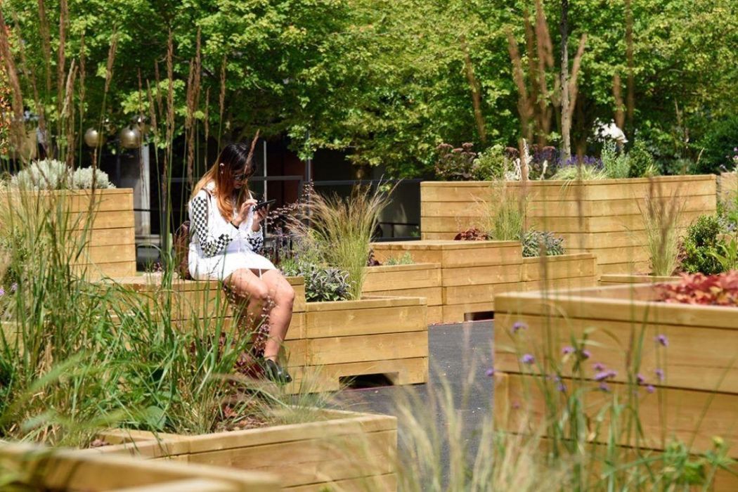 Planters and Seating at Coventry University | Timber Planters | Broxap Street Furniture